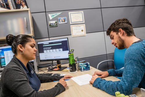 two people at a desk