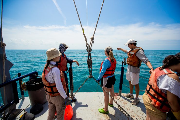 NCF students work on research boat