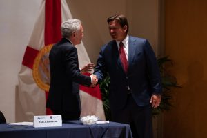 Governor Rick Scott shaking hands with Dr. Scott Atlas